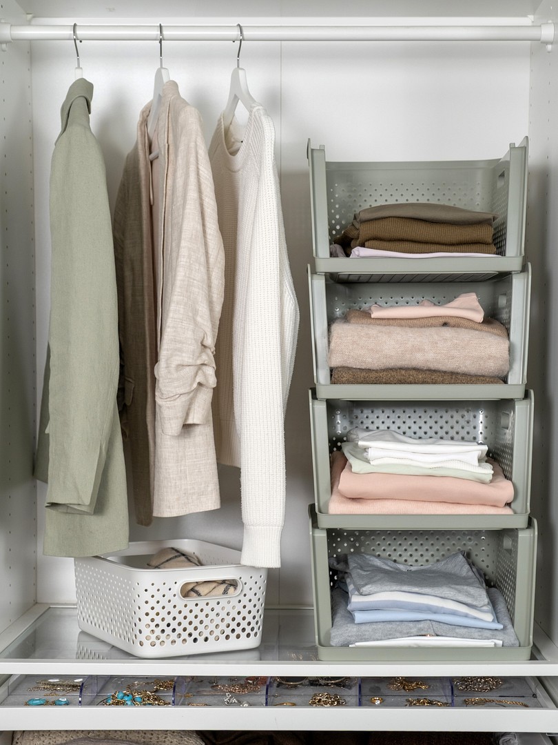 SmartStore Essence Stack storage baskets in a wardrobe built as a storage tower